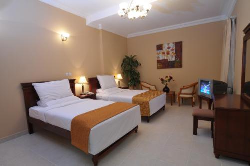 Le Grand Hotel Doha Room photo